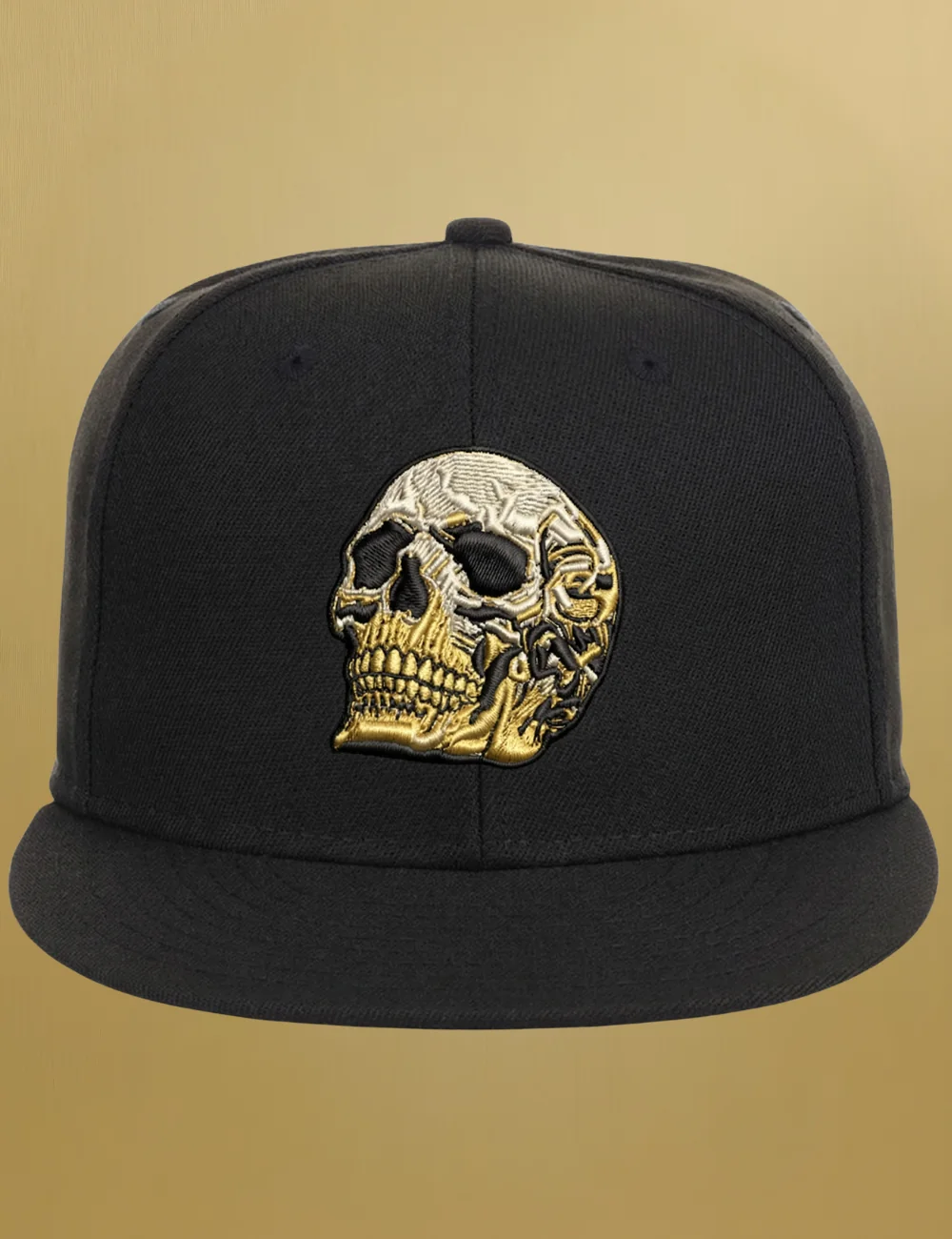 Genesis Snapback, front view with gold and silver skull embroidery